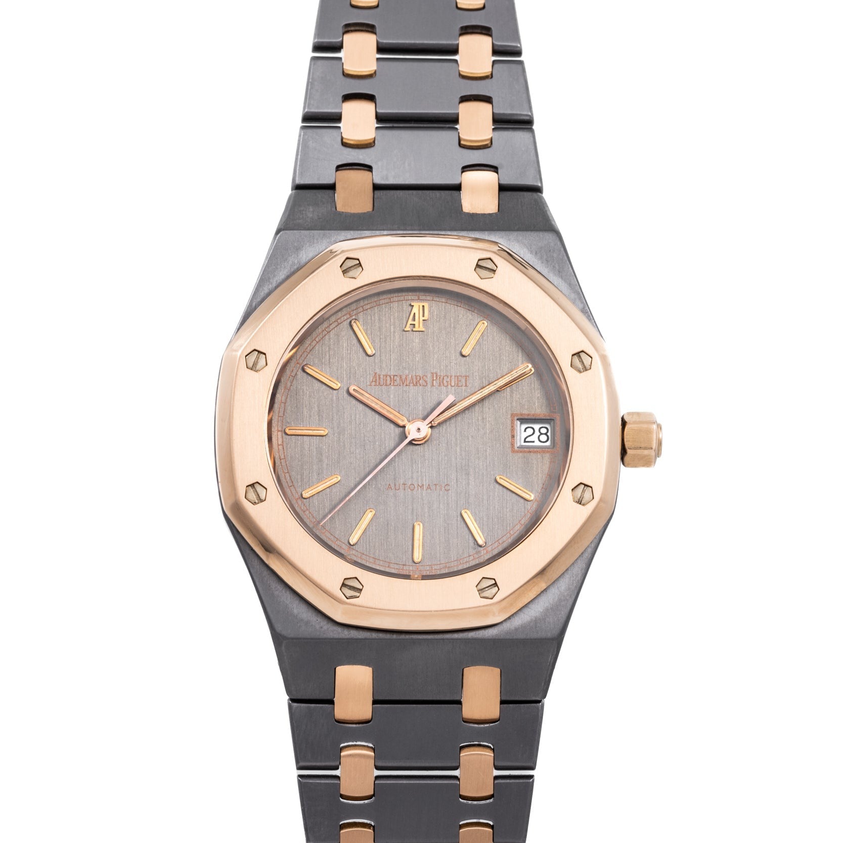 The Audemars Piguet Royal Oak Tantalum is a luxury wristwatch featuring a two-tone metal band and a gray date display dial.