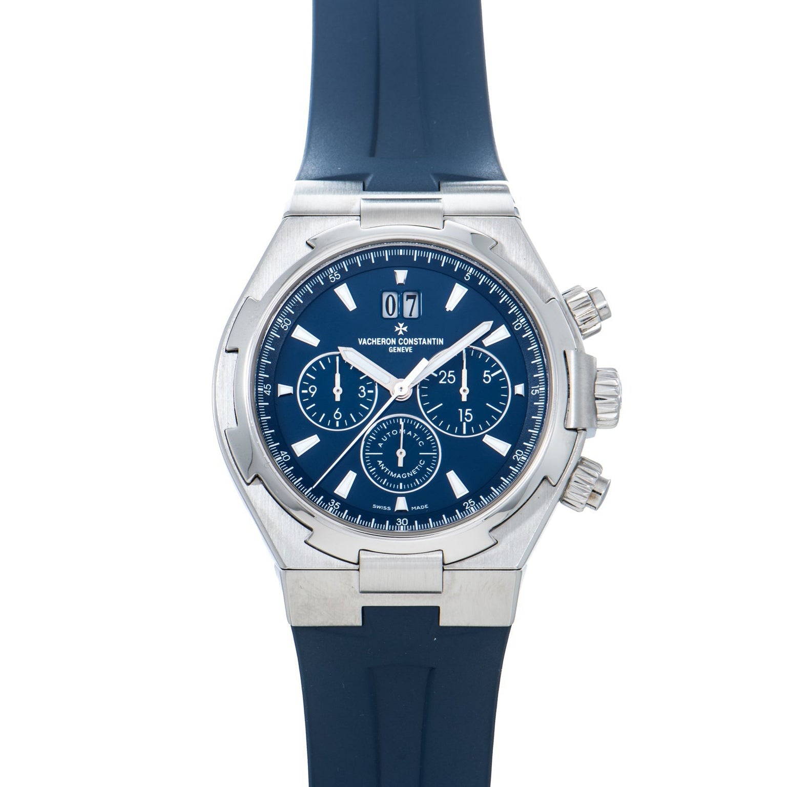 The Vacheron Constantin Overseas Chronograph is a silver watch with a blue face, blue rubber strap, and three subdials.