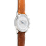 The Vacheron Constantin Historiques Cornes De Vache Chronograph is shown from the front, featuring a silver case, brown leather strap, and white dial.