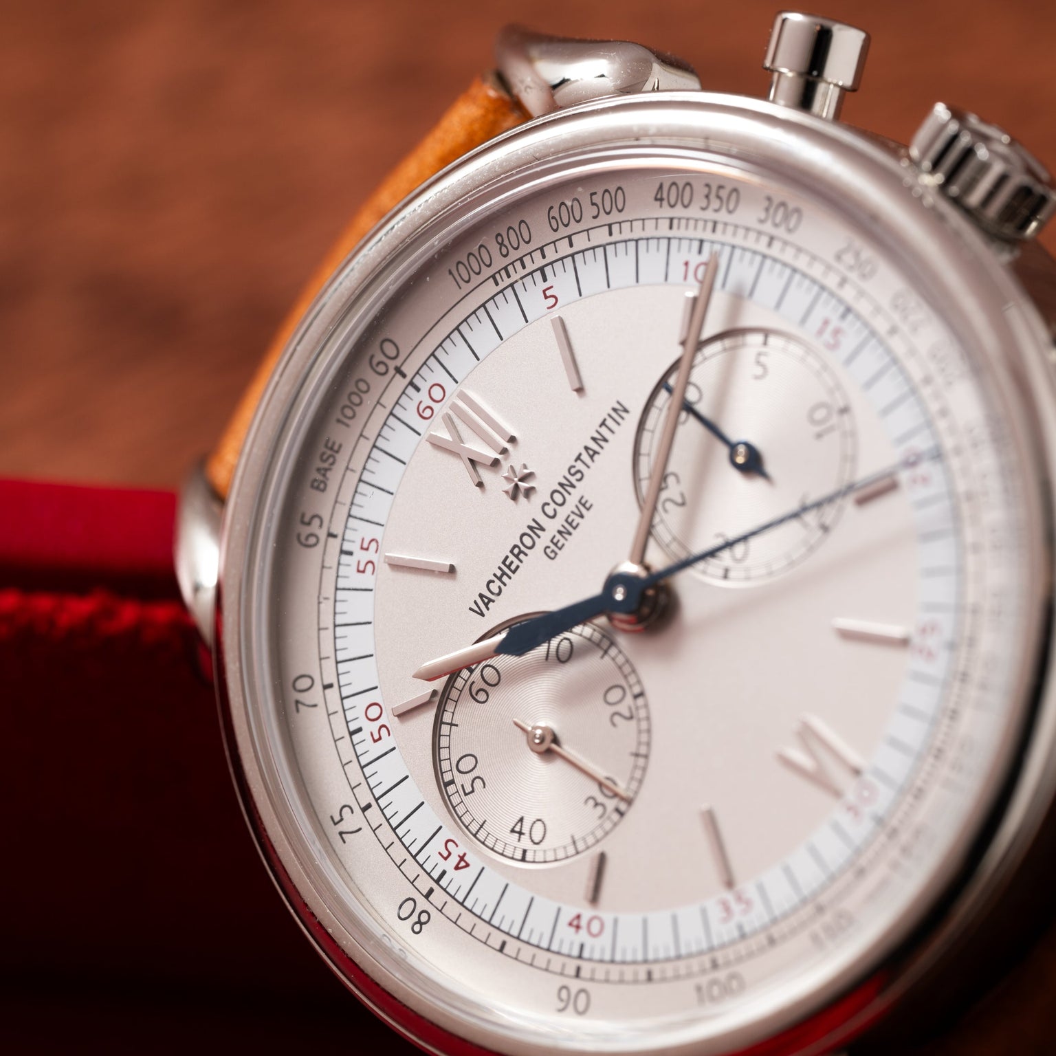 Close-up of the Vacheron Constantin Historiques Cornes De Vache Chronograph watch with a brown leather strap.