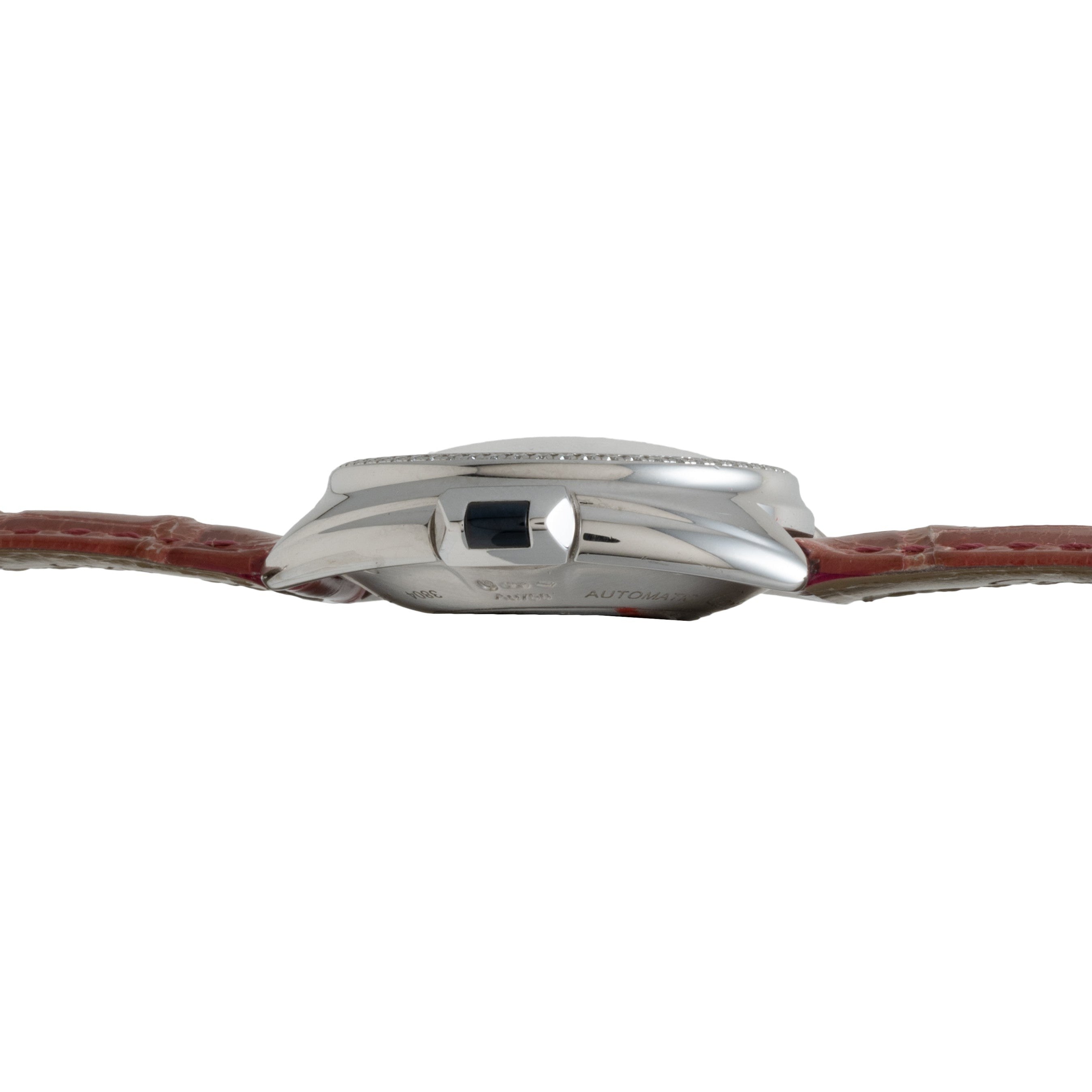 Side view of the Cartier Cle de Diamond, featuring a silver finish, red leather band, and dark crown.