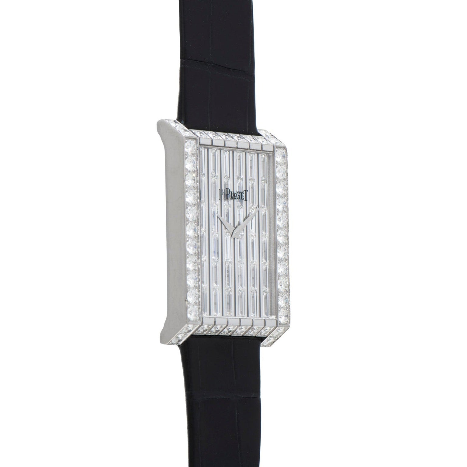 A Piaget Limelight Baguette Diamond Dress Watch with a rectangular case and black leather strap, shown at an angle.