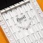 Close-up of Piagets Limelight Baguette Diamond Dress Watch, featuring a rectangular face with diamond accents and silver hands, time set to 2:05.