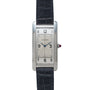 The Cartier Tank Cintrée Piece Unique is a rectangular wristwatch featuring a white dial, black leather strap, and silver case.