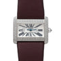Cartier Tank Divan watch featuring a rectangular case, diamond bezel, Roman numerals, and a burgundy strap.