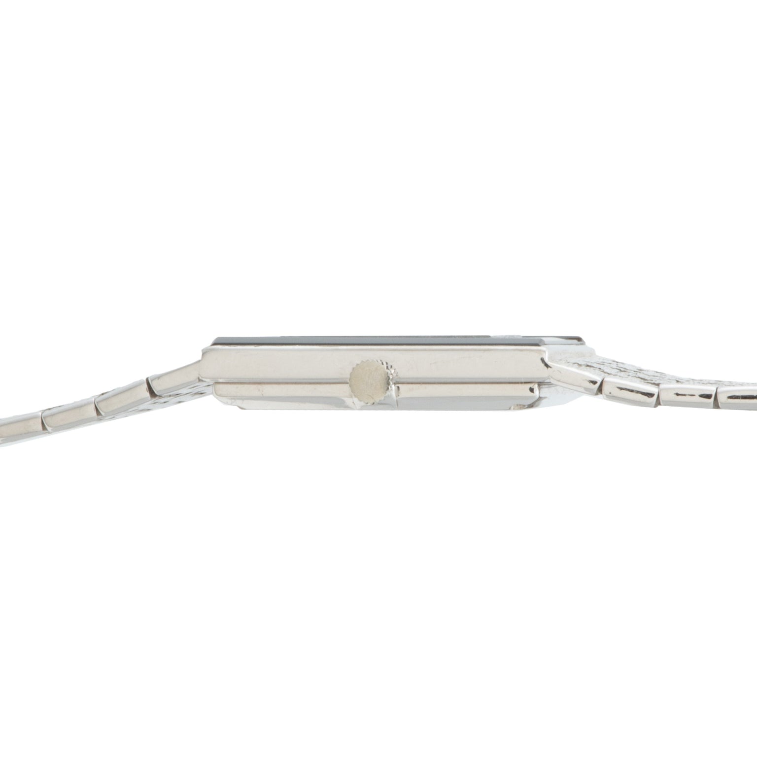 Side view of the Piaget White Gold Onyx Dress Watch, featuring a thin case, metal band, and visible adjustment crown.