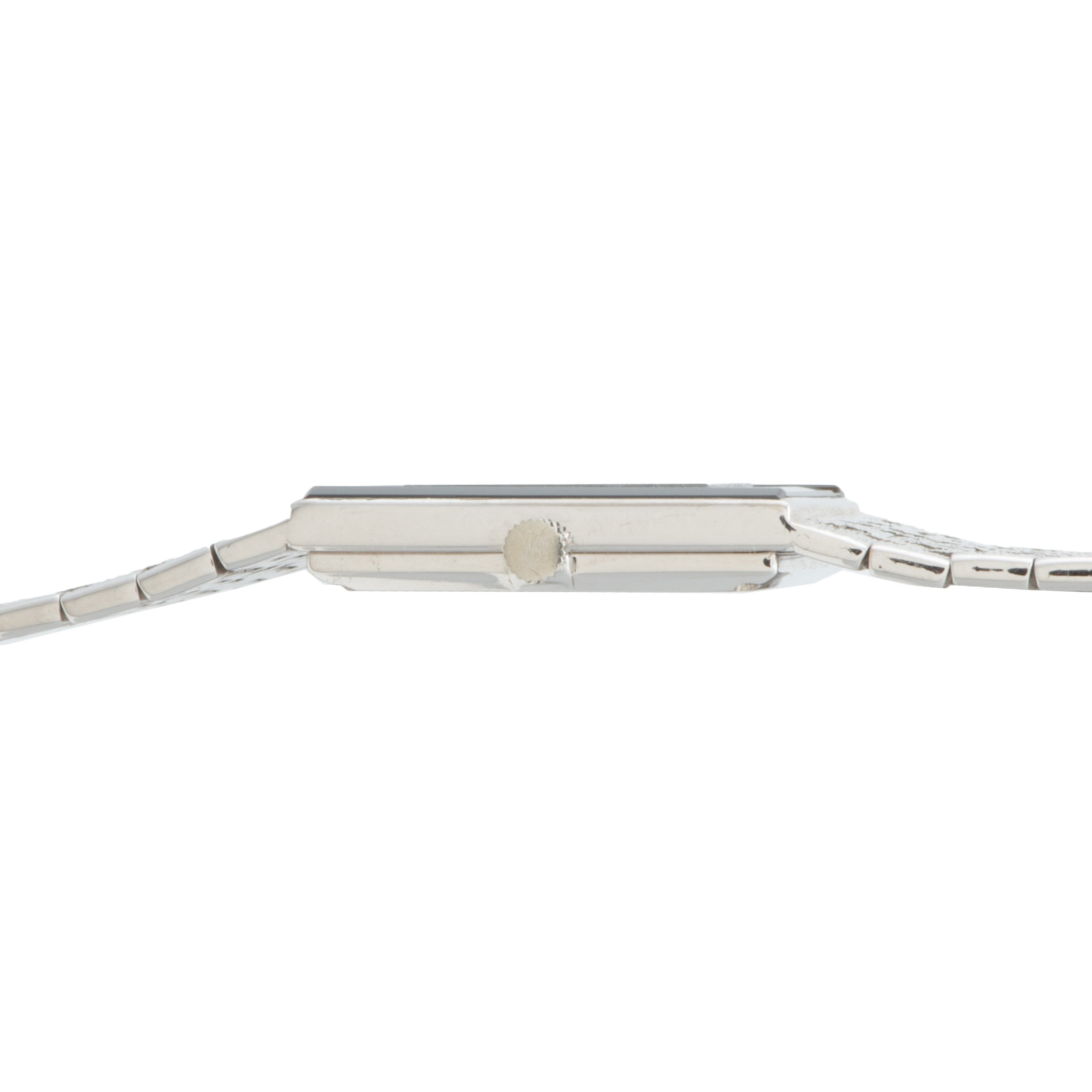 Side view of the Piaget White Gold Onyx Dress Watch, featuring a thin case, metal band, and visible adjustment crown.