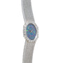The Piaget Opal White Gold Dress Watch features a textured band and an iridescent blue-green opal face.