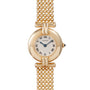 The Ladies Dress Watch by Cartier features a gold finish, round face, Roman numerals, and a beaded metal bracelet.