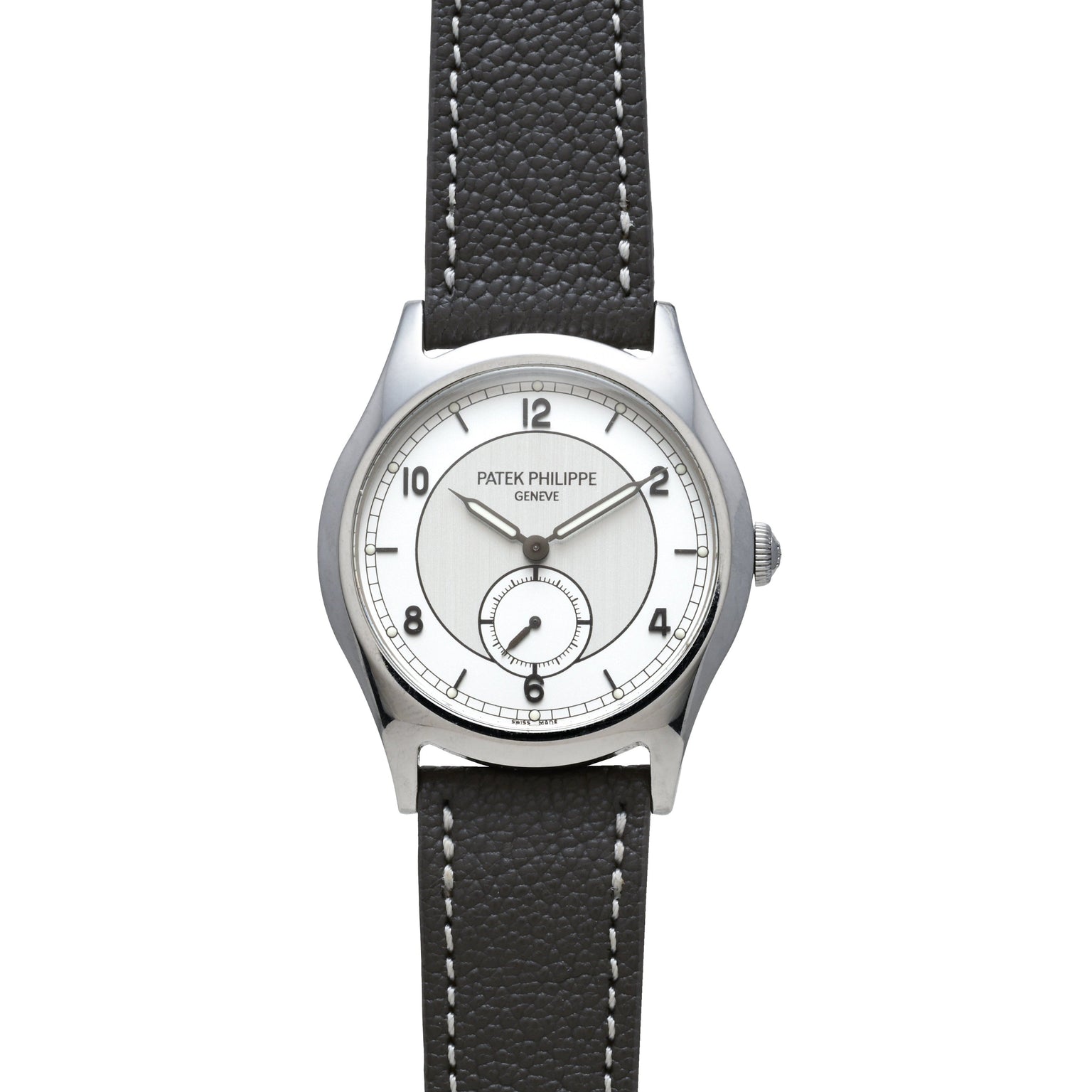 A Patek Philippe Calatrava Geneva Boutique Limited Edition wristwatch with a silver case, white dial, and black leather strap displays the time 12:10.