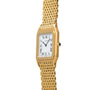Cartier Santos Dumont wristwatch with a square face, Roman numerals, and woven gold band, displayed at an angle on a white background.