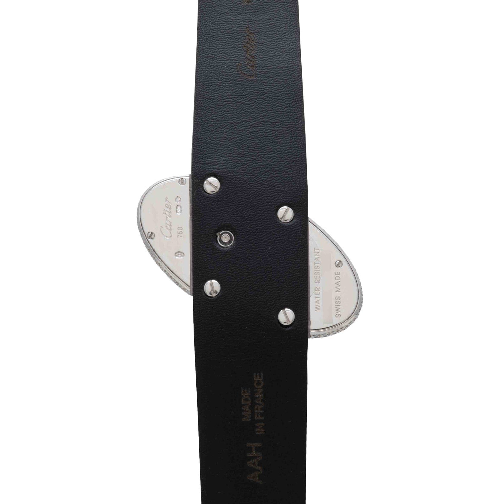 Close-up of a Cartier Libre Hypnose black leather belt highlighting the metal buckle details and engraved text.