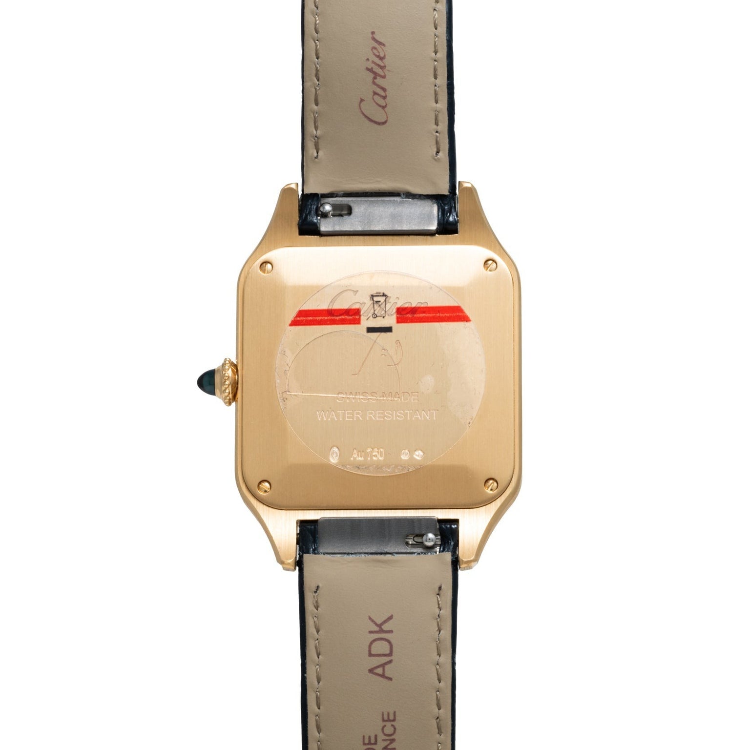 Back view of the Cartier Santos Dumont wristwatch in gold, featuring leather straps and engraved case markings.