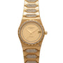 The Vacheron Constantin 222 is a gold watch with diamond accents on the bezel and bracelet, featuring a date display.