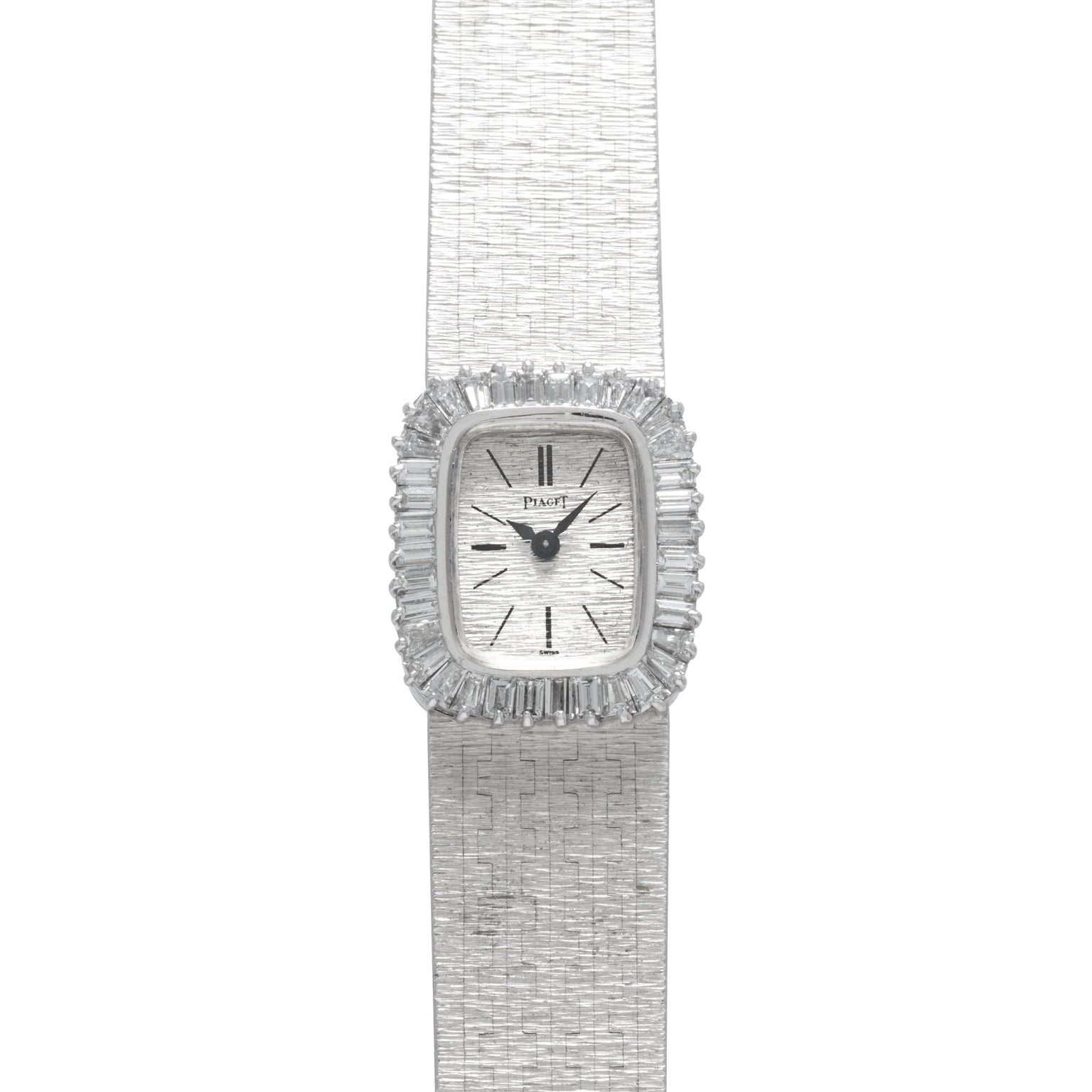 A luxurious Piaget White Gold Bark Diamond Dress Watch featuring a textured band and a diamond-encrusted rectangular face set to 10:09.