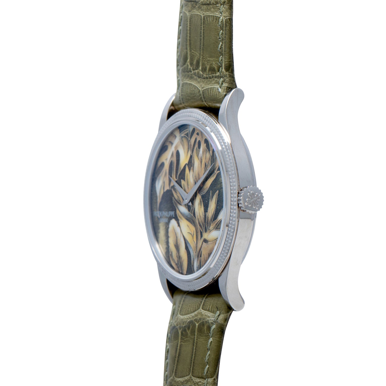Side view of the Patek Philippe Calatrava Cloisonné Tropical Leaves II wristwatch, featuring a green leather strap and a nature-inspired dial design.
