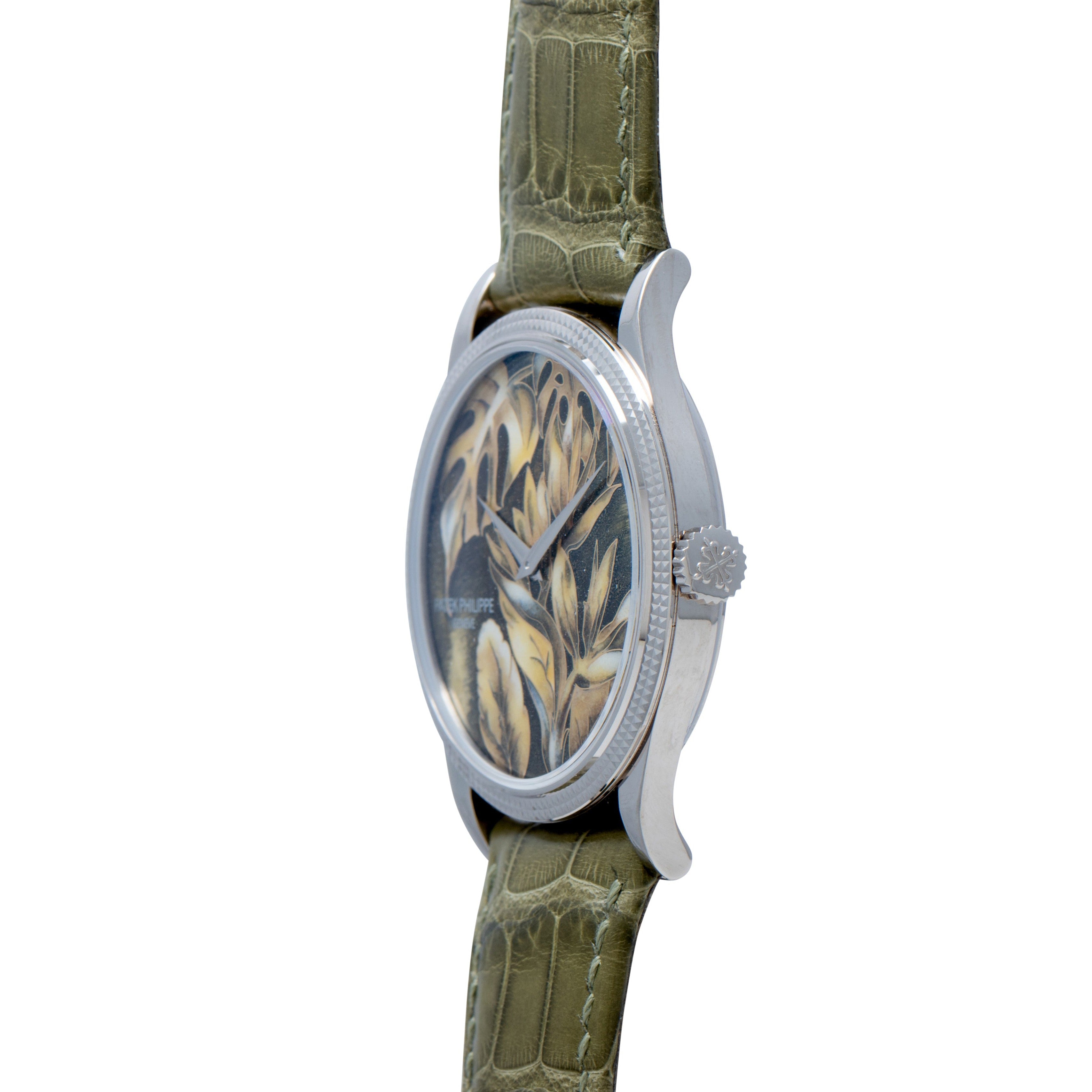 Side view of the Patek Philippe Calatrava Cloisonné Tropical Leaves II wristwatch, featuring a green leather strap and a nature-inspired dial design.
