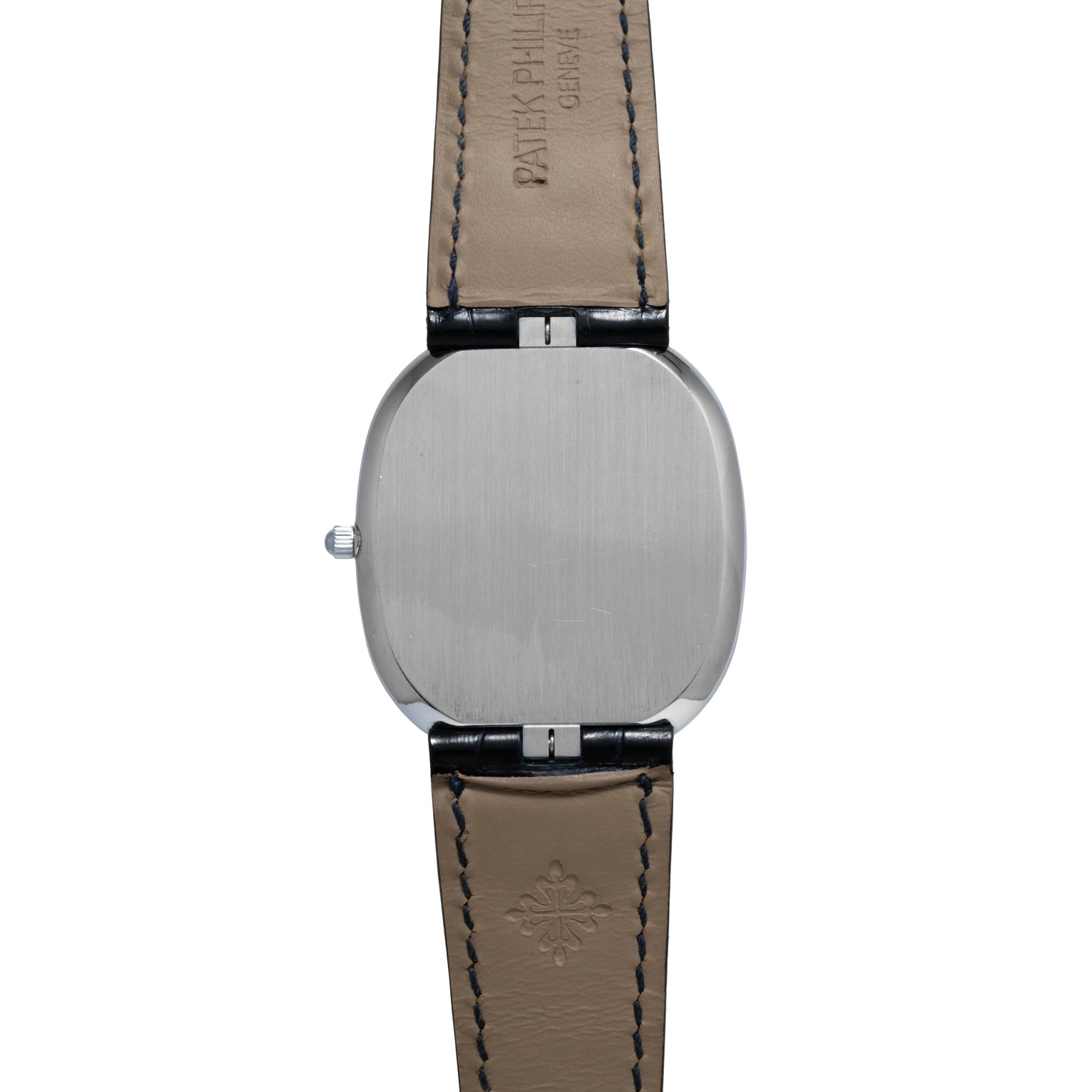 The Patek Philippe Ellipse Jumbo wristwatch features a plain silver case back and a brown leather strap, shown from the back.