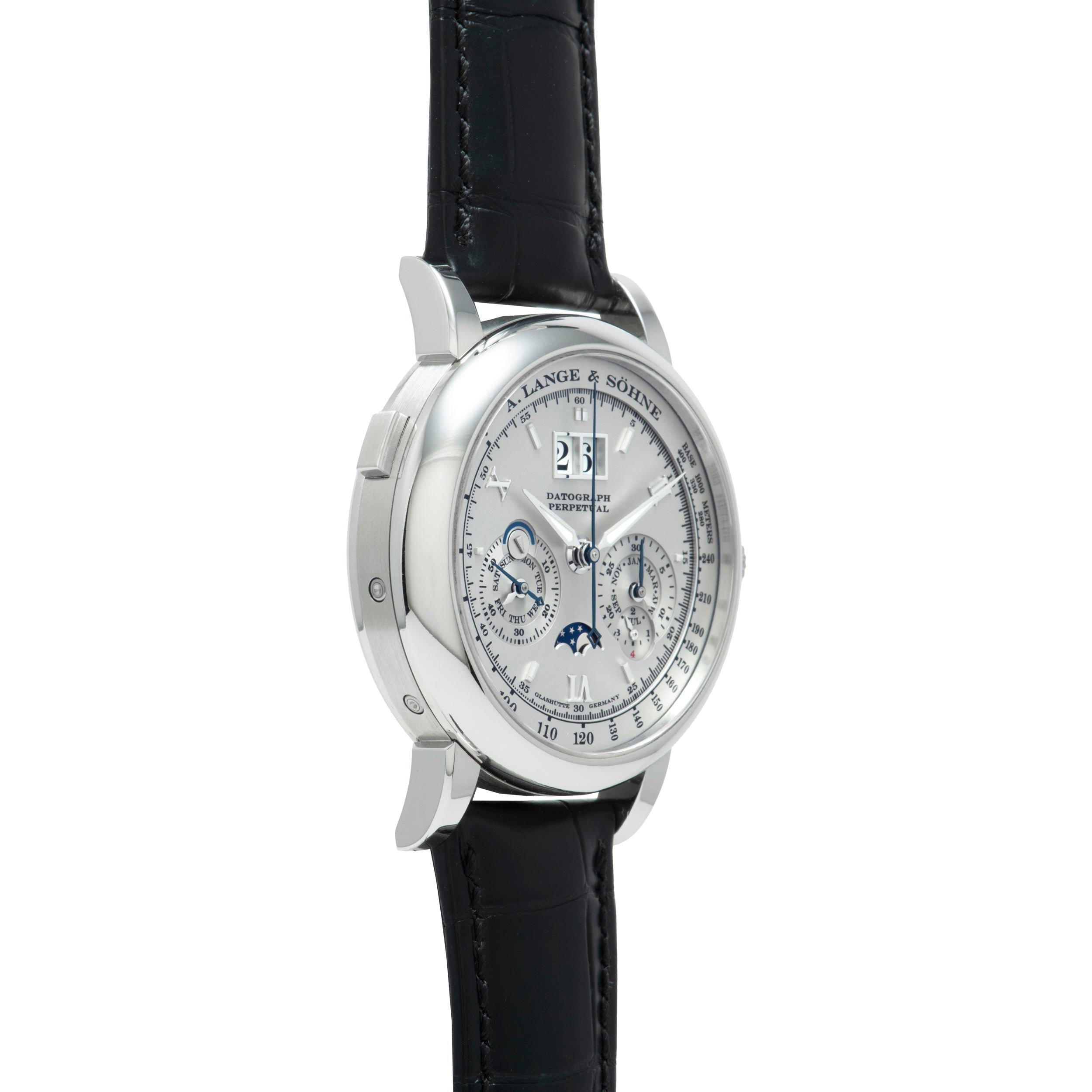 The Lange & Sohne Datograph Perpetual Calendar is a luxury silver wristwatch with a black leather strap, featuring multiple dials and a moonphase display.