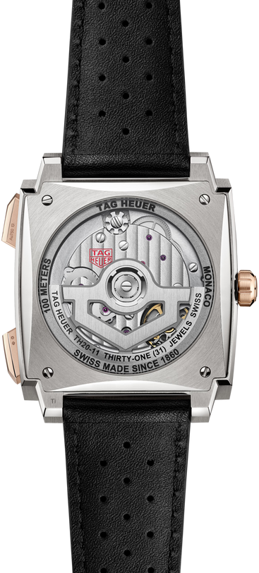 Tag Heuer Monaco chronograph with square steel case, visible movement on back, black perforated leather strap, and rose gold