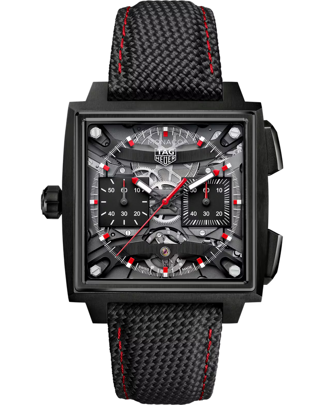 Black square chronograph watch with exposed mechanism, red hands, and black woven strap with red stitching.
