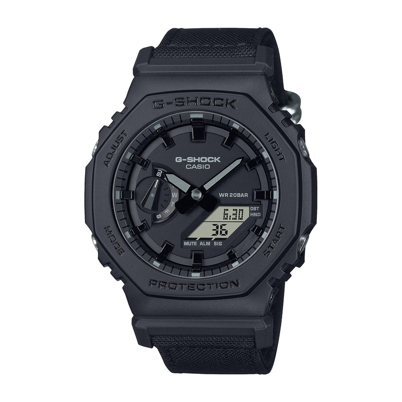 Black G-Shock digital and analog quartz watch with resin case, textured band, and dual time display.