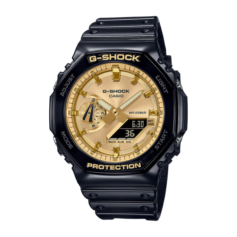 Black resin G-Shock watch with gold-tone dial, digital display, and black band.
