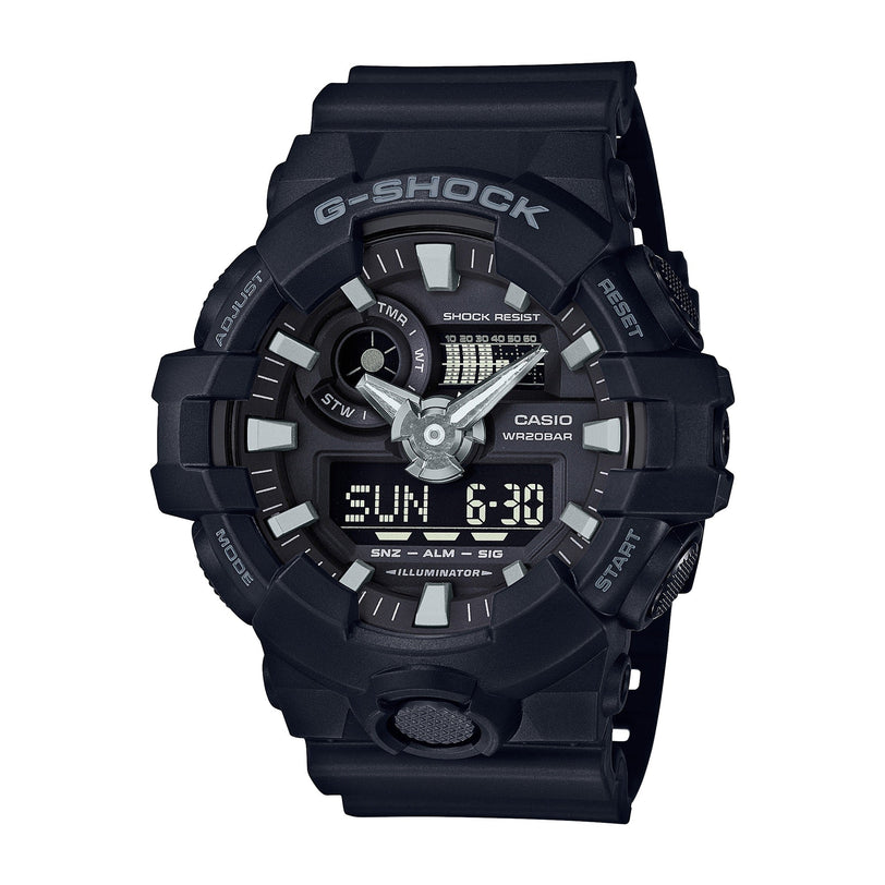 Black G-Shock analog-digital watch with white hour markers, digital display showing time and date, and black resin band.