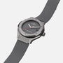 A gray Hublot Classic Fusion Titanium Limited Edition for Hodinkee wristwatch with a rubber strap, black dial, and “NOT FOR RESALE” printed above 6 o’clock—a distinctive piece from Hublot’s special collaboration.