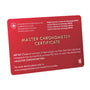 A red Master Chronometer Certificate card from METAS confirms that the OMEGA Speedmaster Moonphase has passed all tests for the “Master Chronometer” distinction.