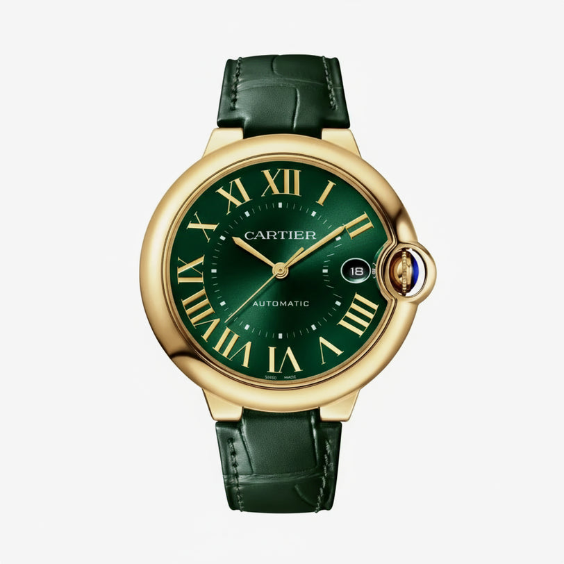 The Ballon Bleu De Cartier Watch by Cartier features a gold case, green dial with gold Roman numerals, date window at 3 o’clock, green leather strap, and refined crown detailing for a luxurious look.