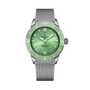 The Breitling Superocean Heritage Automatic 36 features a green dial and bezel, silver hour markers, and a silver mesh strap, showcased on a black background.