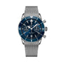 A Breitling Superocean Heritage B01 Chronograph 42 watch featuring a blue dial and silver mesh strap, displayed on a white background.