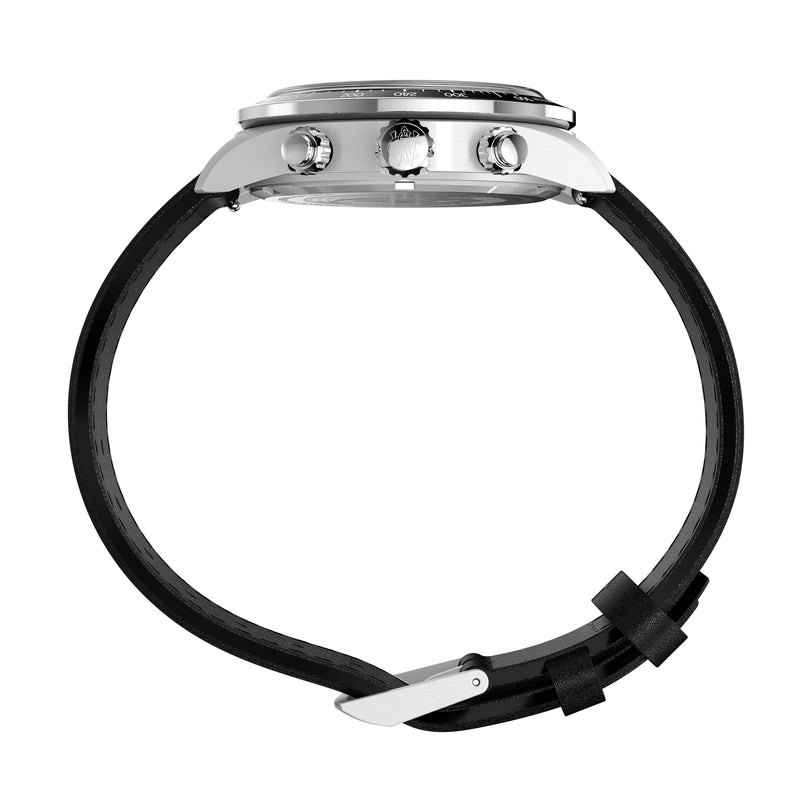 Side view of the Timex Waterbury Heritage Chronograph, featuring a round silver case, three side buttons, and a black leather strap with a silver buckle.