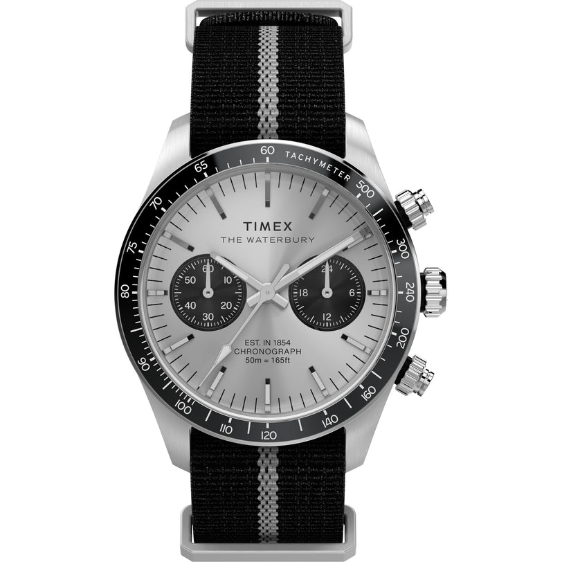 The Timex Waterbury Heritage Chronograph features a silver case, tachymeter bezel, two subdials, black nylon strap with gray stripe, silver hour markers, and is water-resistant up to 50 meters.