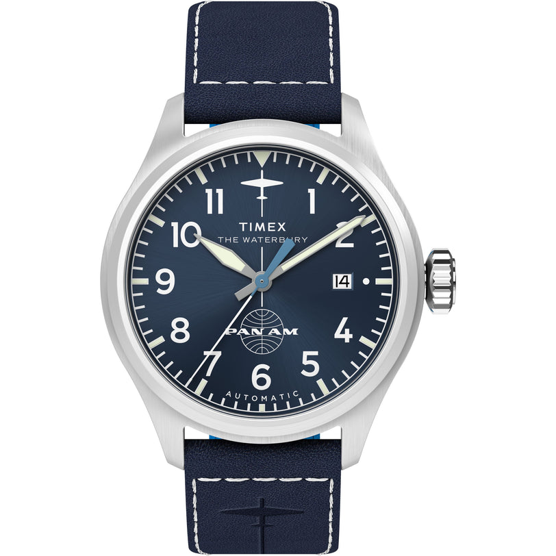 The Timex x Pan Am® Waterbury Automatic Ace features a blue dial with white numerals, date display, Pan Am logo above 6 o’clock, stainless steel case, and a blue leather strap with white stitching.