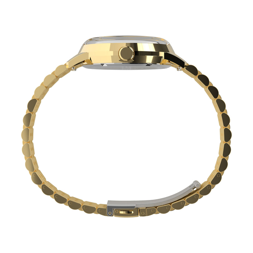 Side view of a Timex Marlin® Quartz GMT with a gold-tone case, linked stainless-steel bracelet, and gold crown and clasp, shown against a white background; the watch face is not visible.