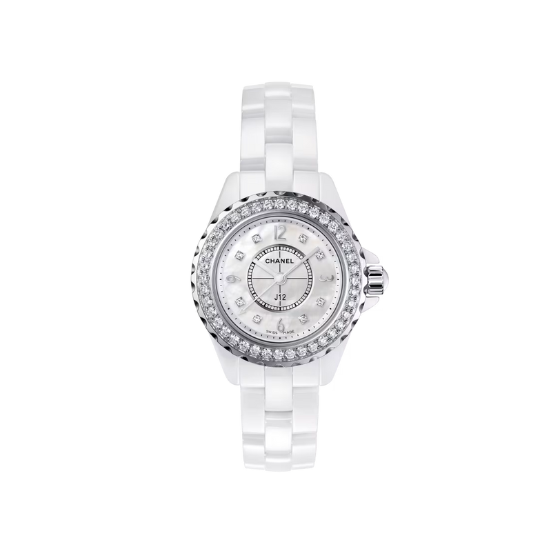 A Chanel J12 white ceramic wristwatch featuring a round mother-of-pearl dial, diamond bezel, silver accents, and a white ceramic link bracelet, shown on a plain white background.