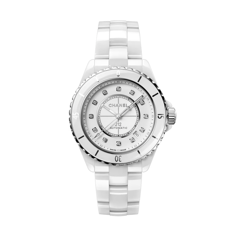 A Chanel J12 automatic wristwatch with a white ceramic bracelet, diamond hour markers, and a polished steel bezel is displayed on a plain white background.