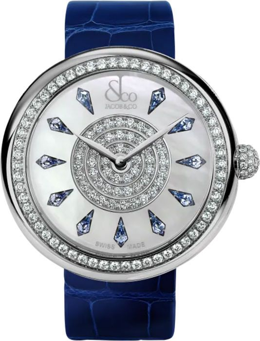 Round watch with silver case, diamond bezel, white dial, blue sapphire hour markers, and navy crocodile leather strap.