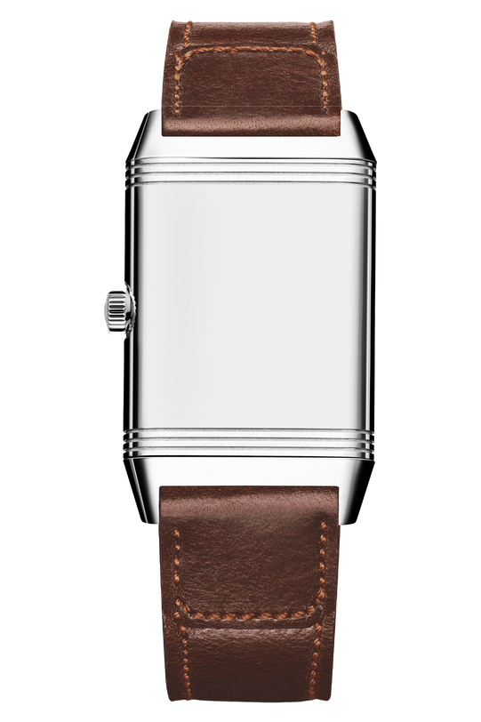 A Jaeger-LeCoultre Reverso Classic Duoface Small Seconds wristwatch in steel with a blank silver face, brown leather strap, and left-side crown, designed to track two time zones, set against a white background.