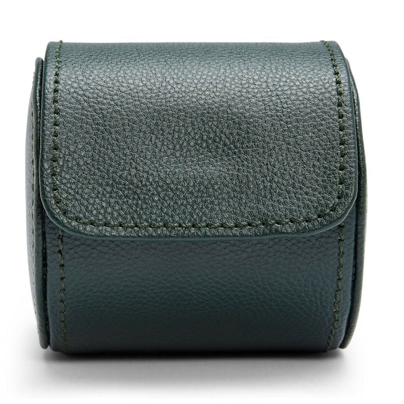 Green leather watch roll with snap closure and contrasting stitching detail.