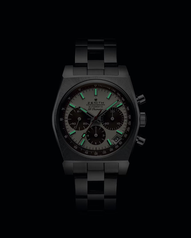 Black watch with green accents on a black background