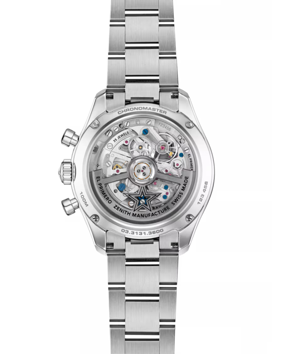 Silver stainless steel chronograph watch with visible skeleton dial showing mechanical movement and bracelet strap.