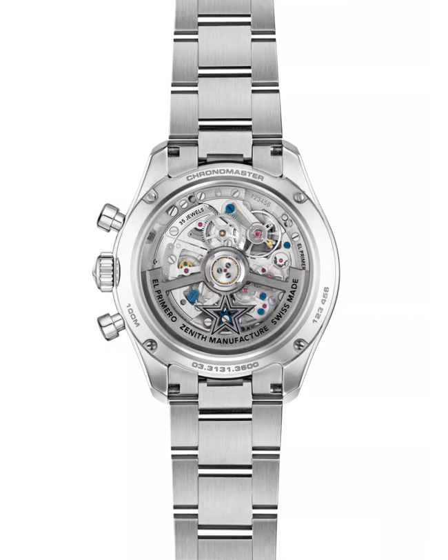 Silver stainless steel chronograph watch with visible skeleton dial showing mechanical movement and bracelet strap.