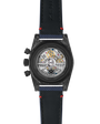 Back view of a Zenith watch with visible mechanical components on a black background