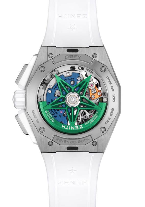Close-up of the back of the Zenith Defy Extreme Chroma, featuring its intricate mechanical movement, green and blue accents, El Primero 9004 star-shaped rotor, and engraved markings inside a silver-toned case with a white strap.