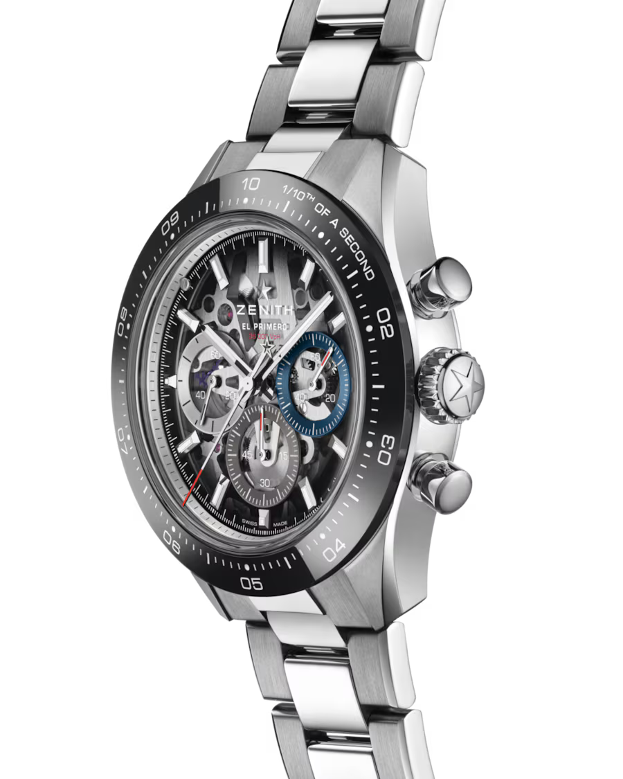 Silver and black chronograph watch with skeleton dial, blue subdial, and two-tone metal bracelet.