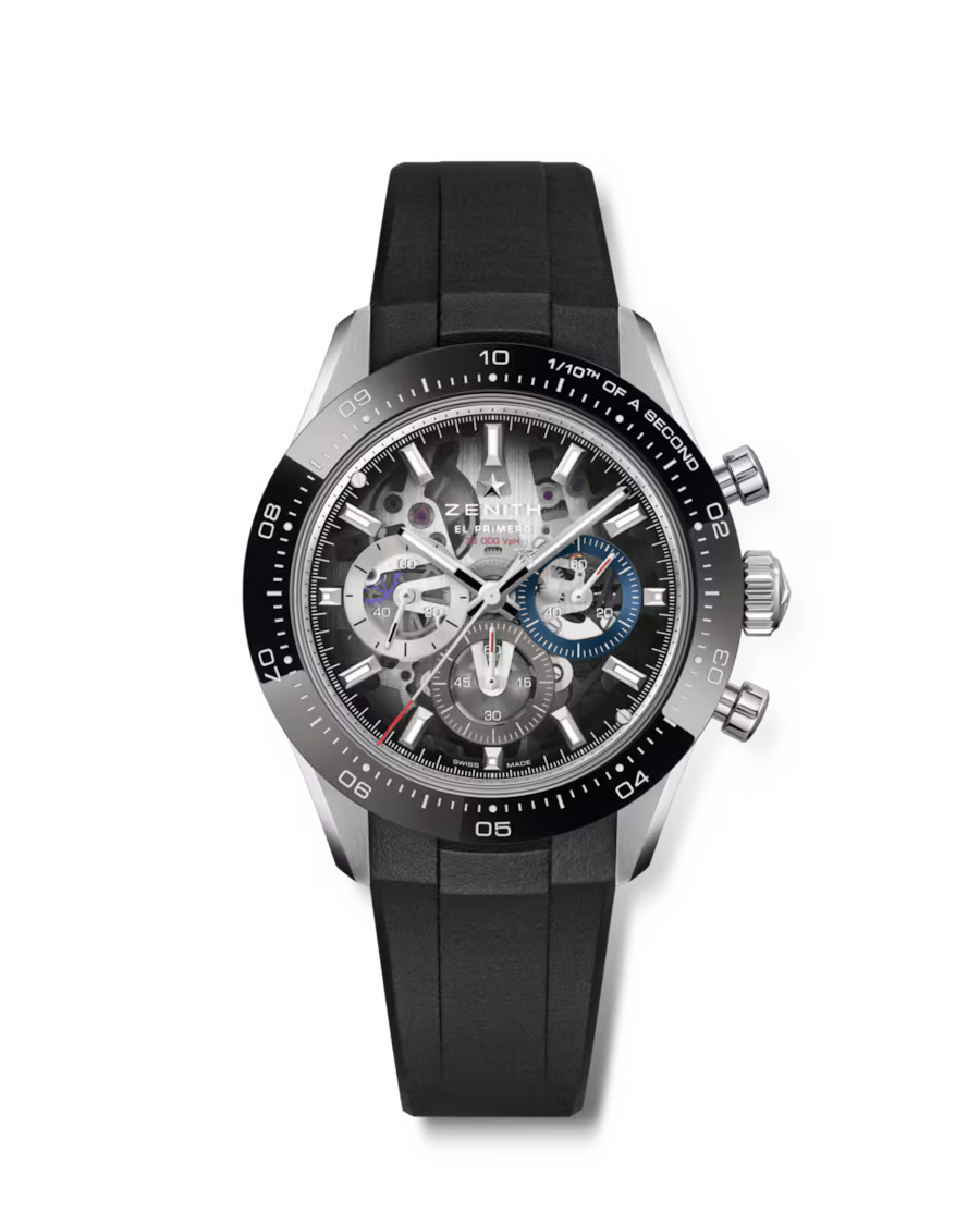 Silver chronograph watch with black dial, visible movement, and black rubber strap.