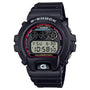 Black G-Shock digital watch with red bezel, digital display showing time, and black resin band.